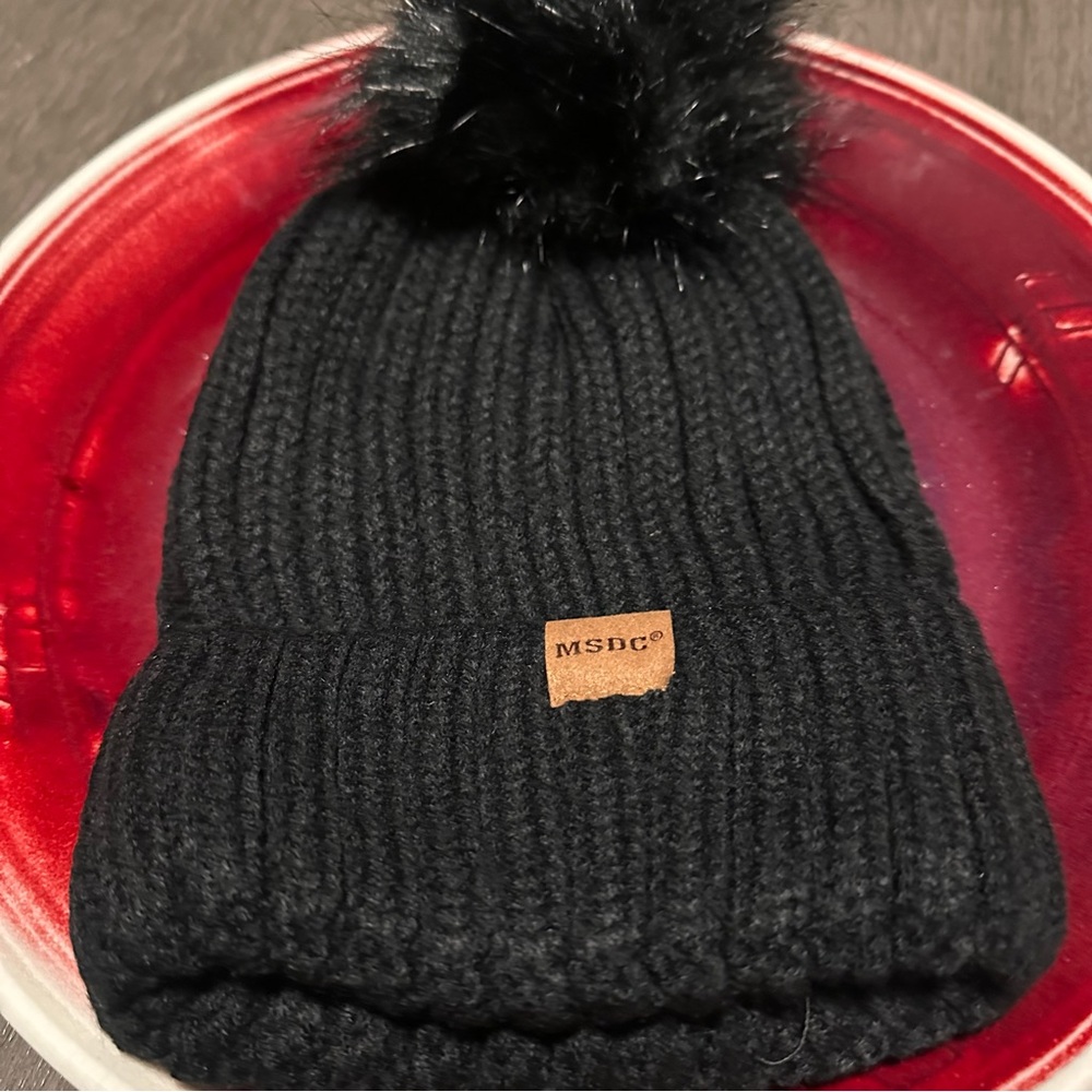 Brand New MSDC Women's Knit Black Beanie featuring a Playful Pom-Pom